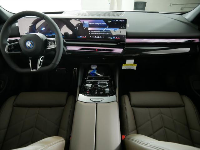 new 2026 BMW 550e car, priced at $84,035