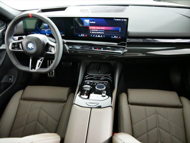 used 2024 BMW i5 car, priced at $69,000