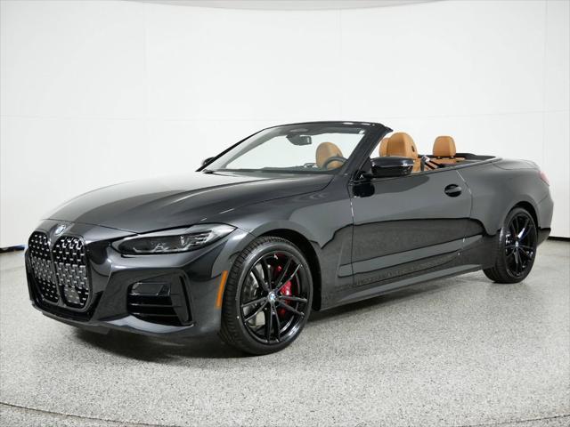 used 2024 BMW M4 car, priced at $75,220