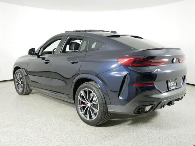 new 2025 BMW X6 car, priced at $83,885