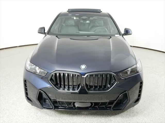 new 2025 BMW X6 car, priced at $83,885