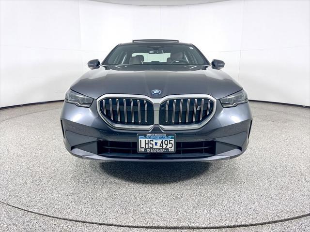 used 2024 BMW i5 car, priced at $65,595