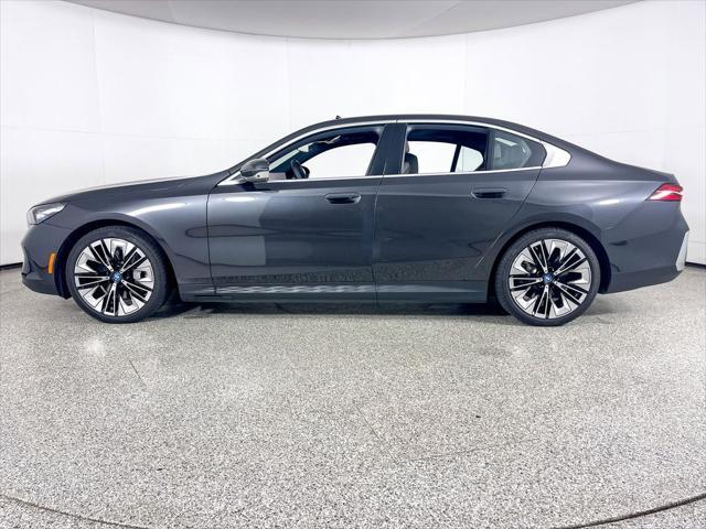 used 2024 BMW i5 car, priced at $65,595