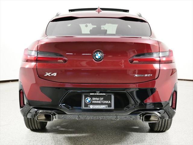 used 2024 BMW X4 car, priced at $54,825