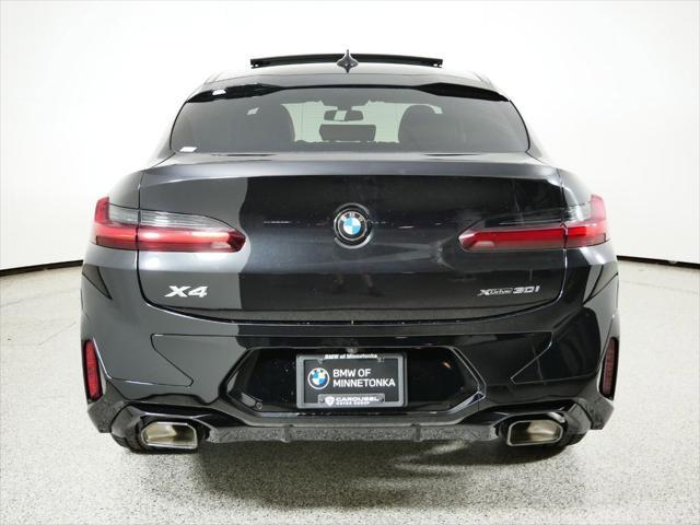 used 2025 BMW X4 car, priced at $61,145