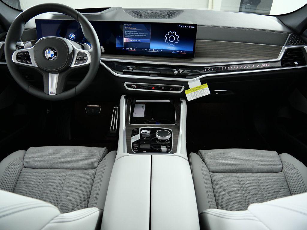 new 2026 BMW X6 car, priced at $90,665