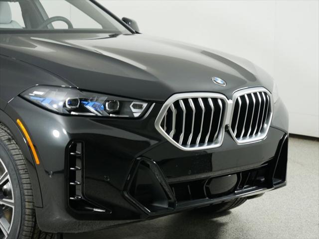 used 2025 BMW X6 car, priced at $77,875