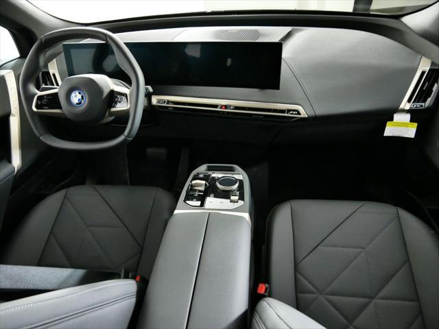 new 2024 BMW iX car, priced at $97,545