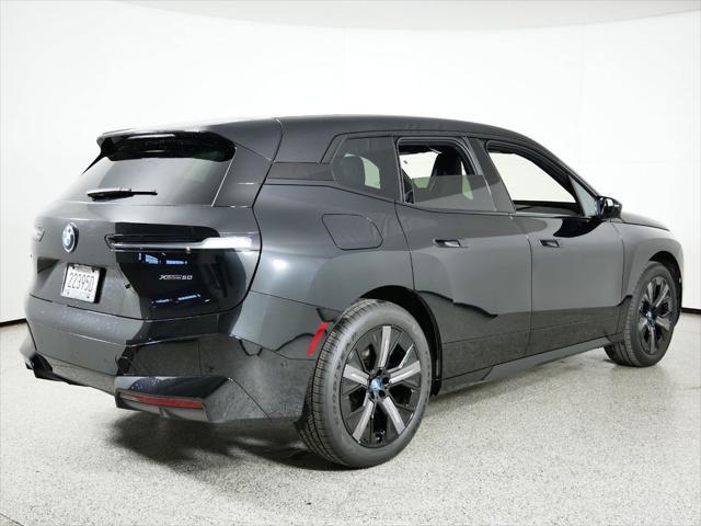 new 2024 BMW iX car, priced at $97,545