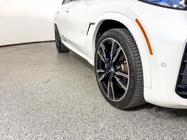 used 2024 BMW X6 car, priced at $94,000