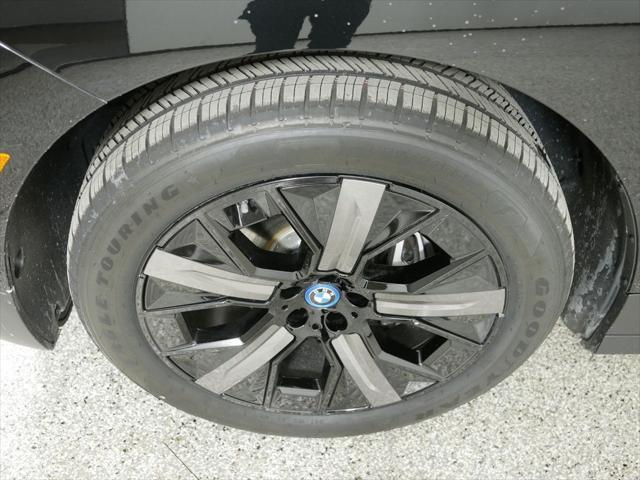 new 2025 BMW iX car, priced at $92,095