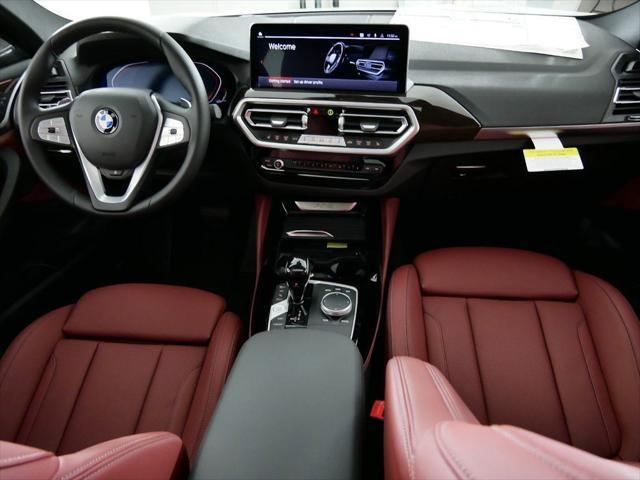 used 2024 BMW X4 car, priced at $55,120