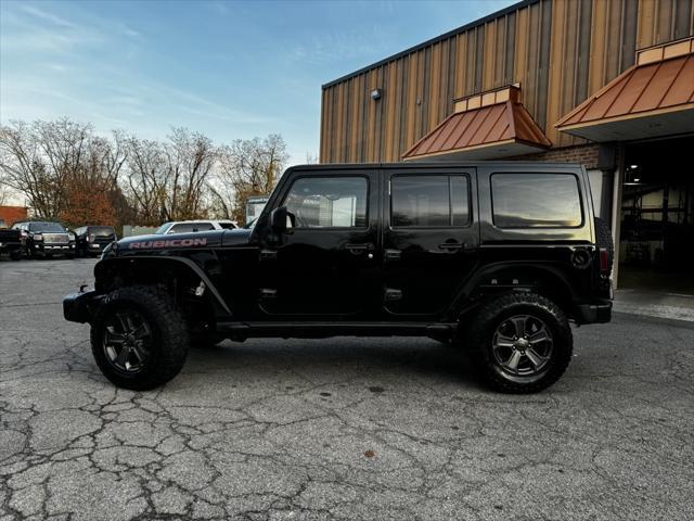 used 2018 Jeep Wrangler JK Unlimited car, priced at $19,290