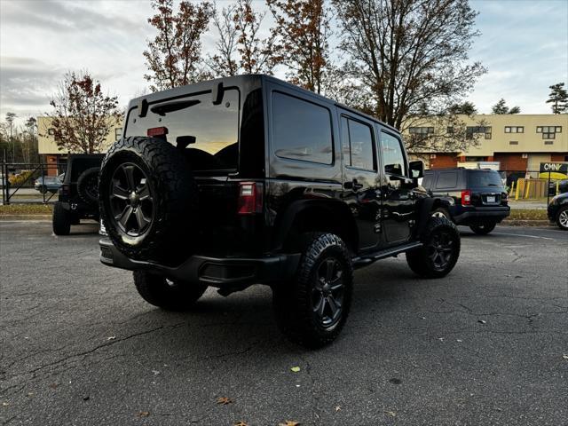 used 2018 Jeep Wrangler JK Unlimited car, priced at $19,290