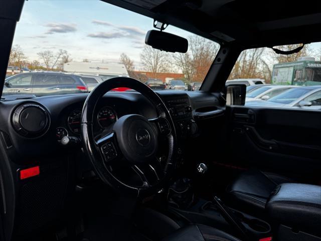 used 2018 Jeep Wrangler JK Unlimited car, priced at $19,290