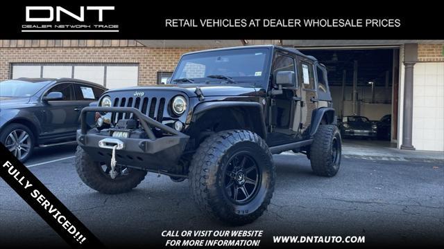 used 2015 Jeep Wrangler Unlimited car, priced at $19,899