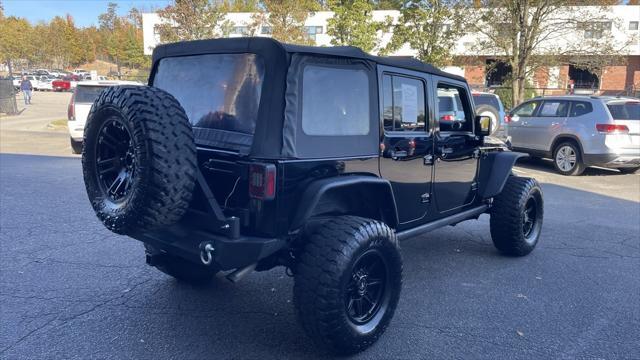 used 2015 Jeep Wrangler Unlimited car, priced at $19,899