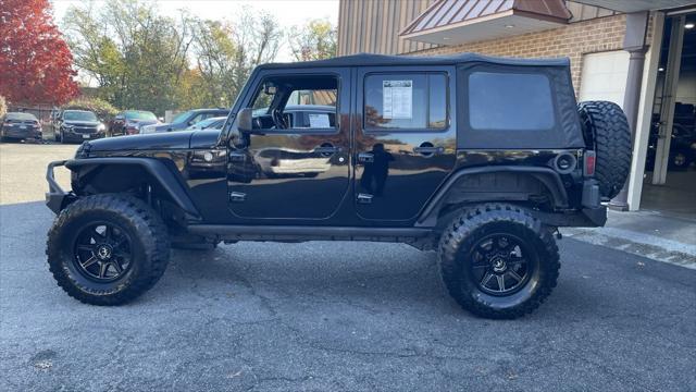 used 2015 Jeep Wrangler Unlimited car, priced at $19,899