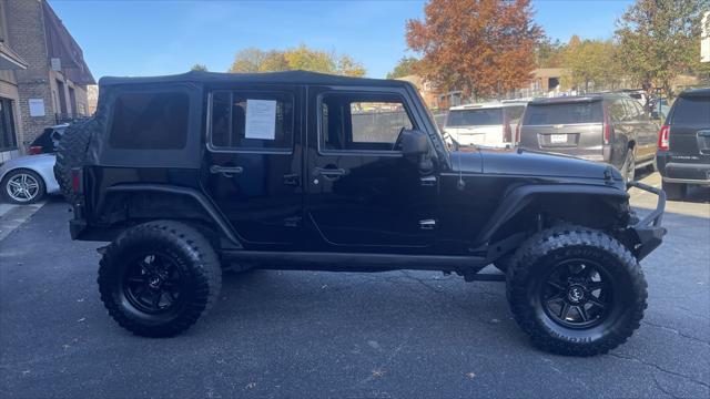 used 2015 Jeep Wrangler Unlimited car, priced at $19,899