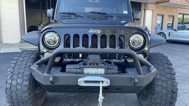 used 2015 Jeep Wrangler Unlimited car, priced at $19,899