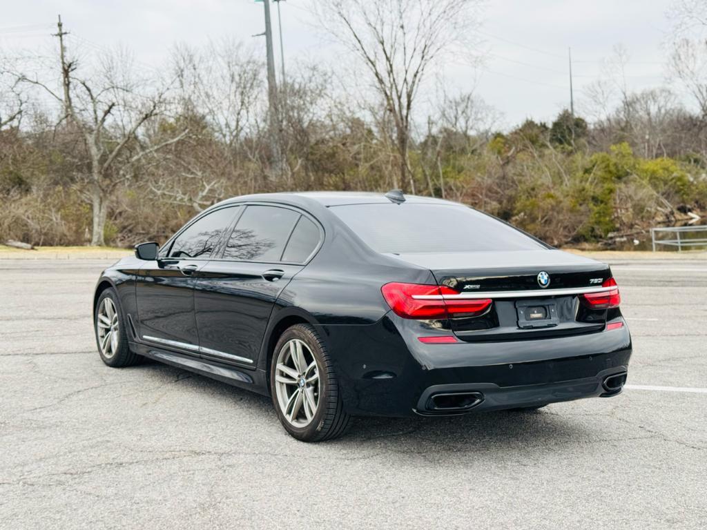 used 2016 BMW 750 car, priced at $16,995