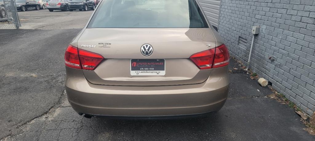 used 2015 Volkswagen Passat car, priced at $6,995