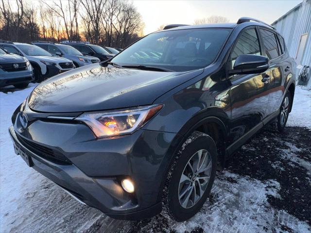 used 2018 Toyota RAV4 Hybrid car, priced at $18,999