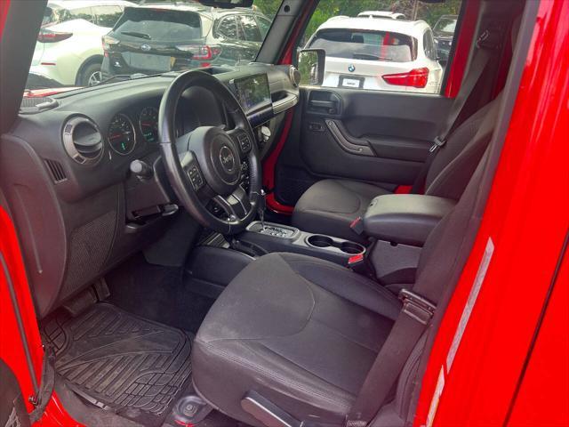 used 2015 Jeep Wrangler Unlimited car, priced at $15,999