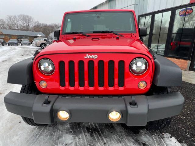 used 2015 Jeep Wrangler Unlimited car, priced at $16,999