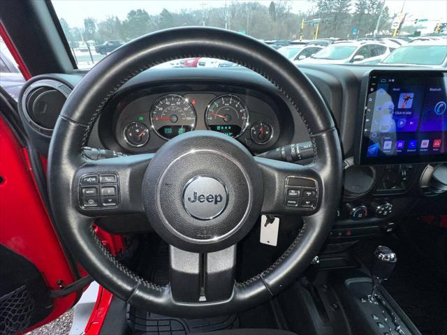 used 2015 Jeep Wrangler Unlimited car, priced at $16,999