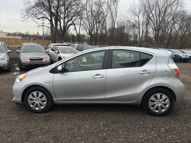 used 2014 Toyota Prius c car, priced at $9,999