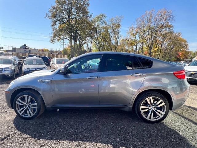 used 2013 BMW X6 M car, priced at $17,650