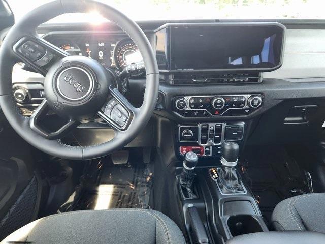 used 2025 Jeep Wrangler car, priced at $49,999