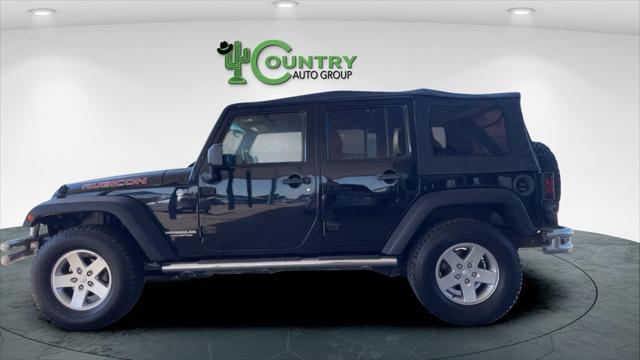 used 2011 Jeep Wrangler Unlimited car, priced at $14,500