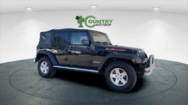 used 2011 Jeep Wrangler Unlimited car, priced at $14,500