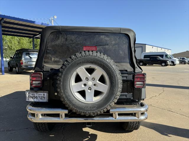 used 2011 Jeep Wrangler Unlimited car, priced at $14,500