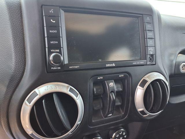 used 2014 Jeep Wrangler Unlimited car, priced at $16,961