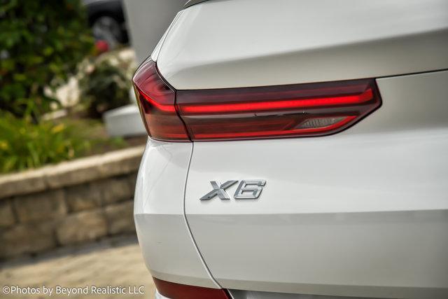 used 2023 BMW X6 car, priced at $67,784
