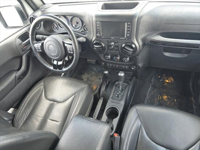 used 2015 Jeep Wrangler Unlimited car, priced at $19,287