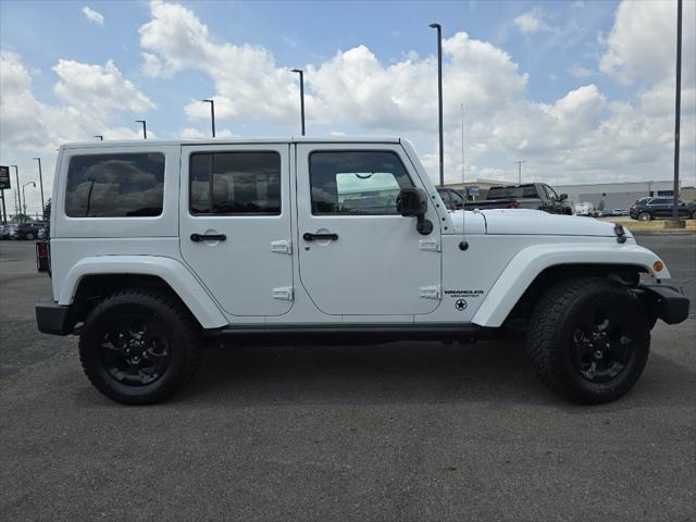 used 2015 Jeep Wrangler Unlimited car, priced at $19,287