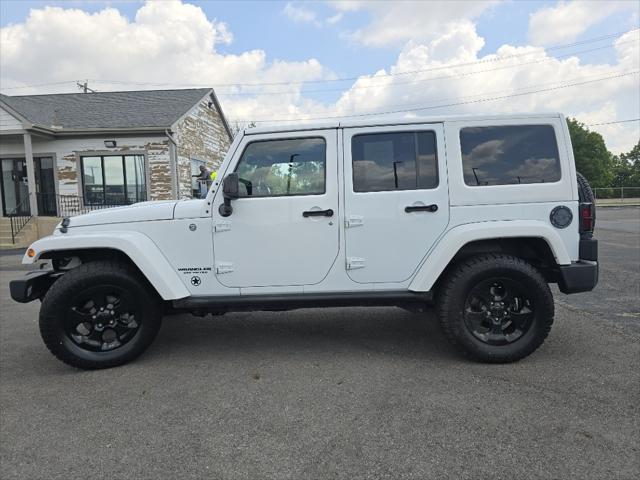 used 2015 Jeep Wrangler Unlimited car, priced at $19,287