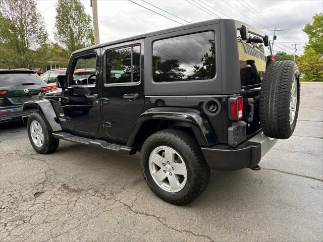 used 2011 Jeep Wrangler Unlimited car, priced at $13,995