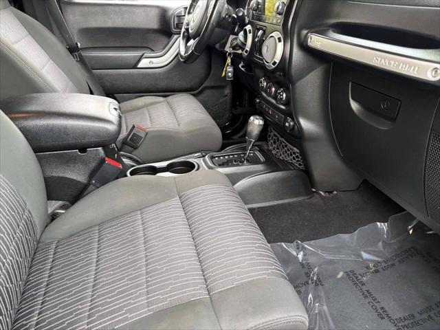 used 2011 Jeep Wrangler Unlimited car, priced at $13,995