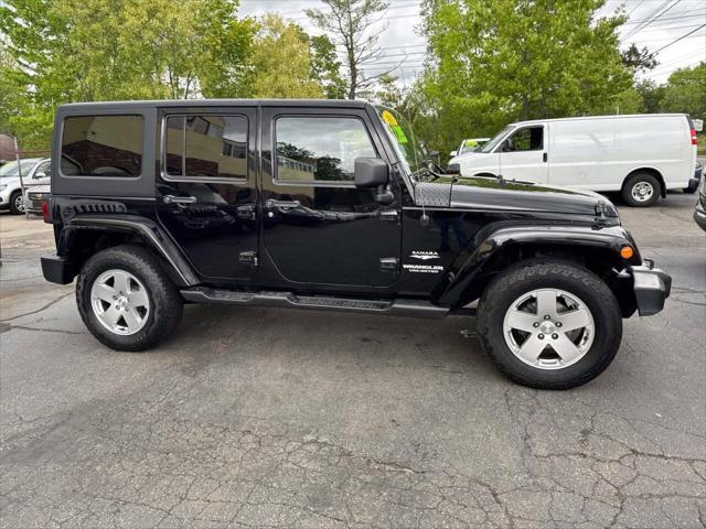used 2011 Jeep Wrangler Unlimited car, priced at $13,995