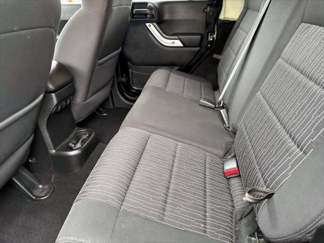 used 2011 Jeep Wrangler Unlimited car, priced at $13,995