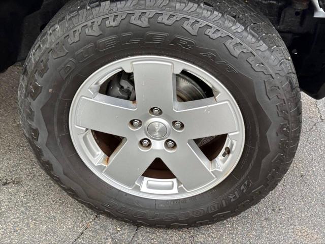 used 2011 Jeep Wrangler Unlimited car, priced at $13,995