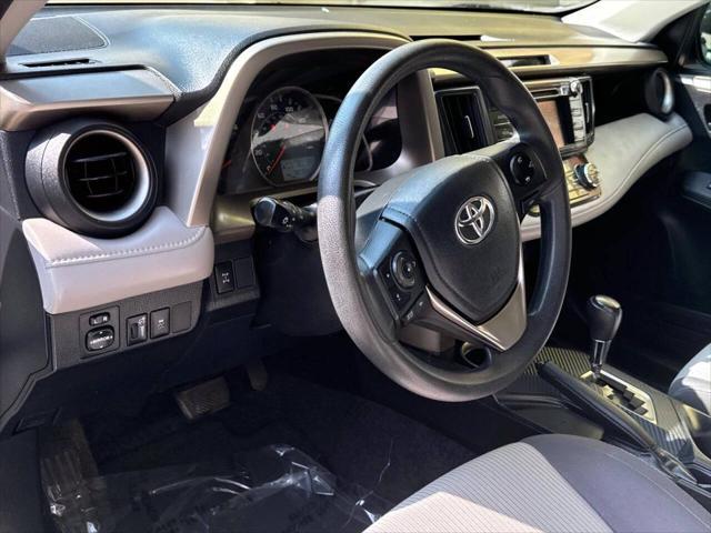 used 2013 Toyota RAV4 car, priced at $14,895