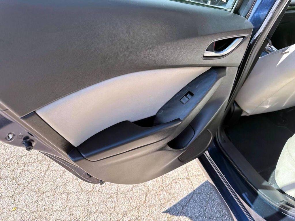 used 2015 Mazda Mazda3 car, priced at $9,995