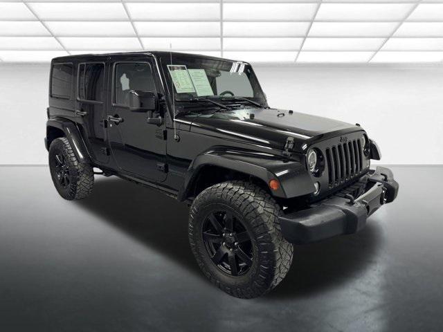 used 2014 Jeep Wrangler Unlimited car, priced at $22,129