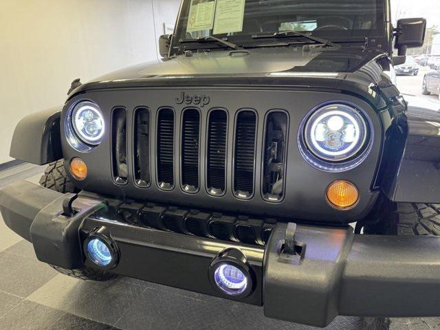 used 2014 Jeep Wrangler Unlimited car, priced at $22,129